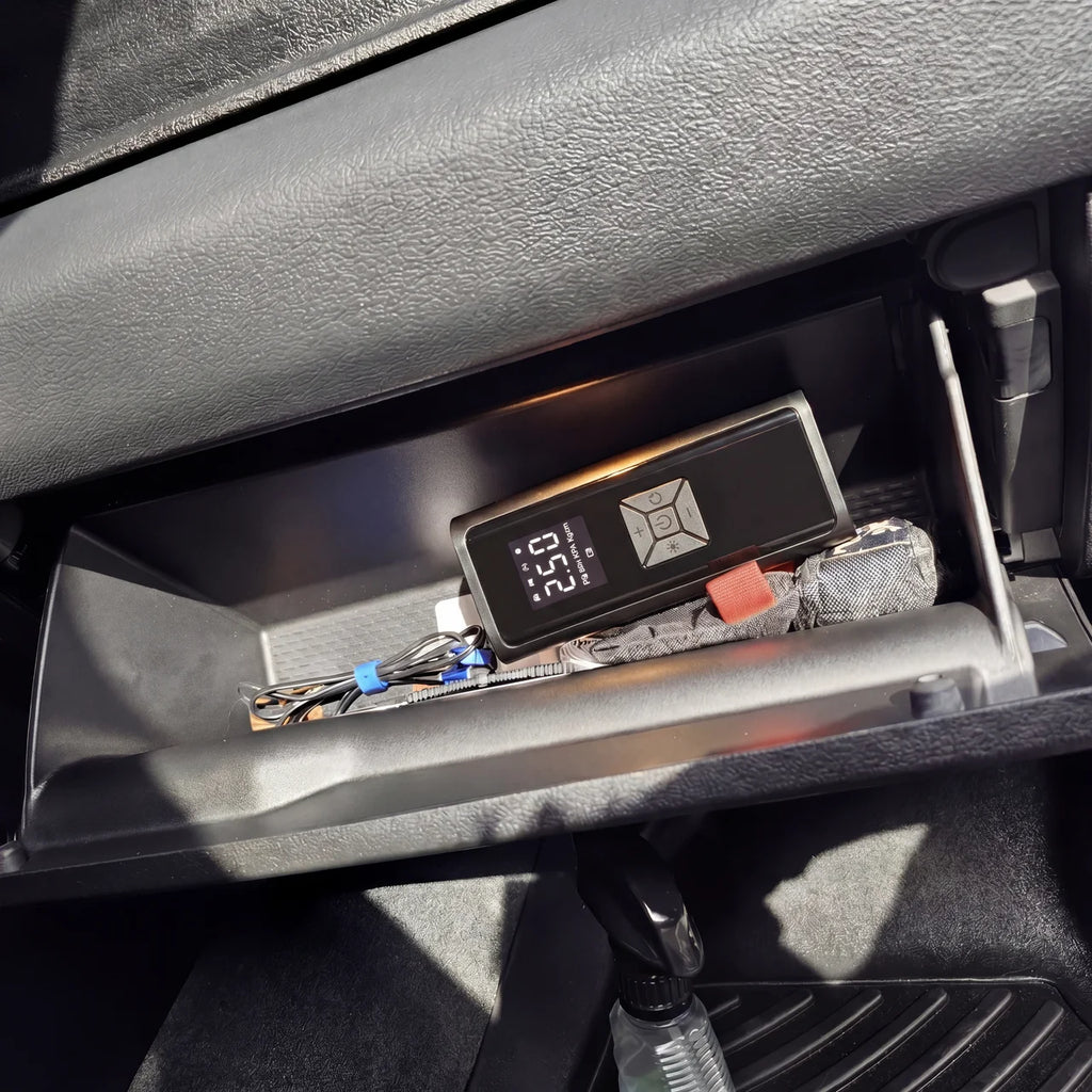 Volktr Air Pro side angle showing matte black housing, USB-C charging port, and built-in LED light