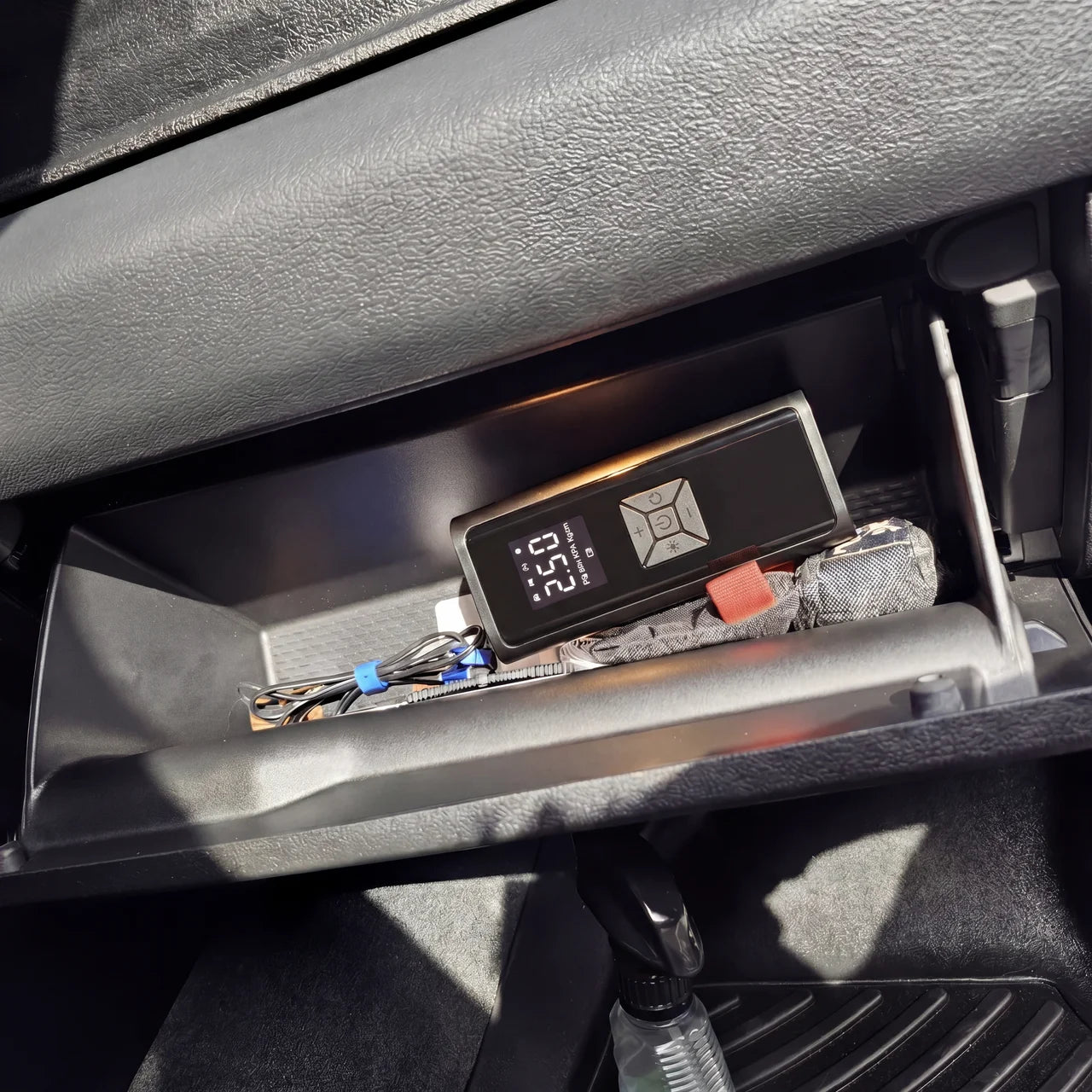 Volktr Air Pro side angle showing matte black housing, USB-C charging port, and built-in LED light